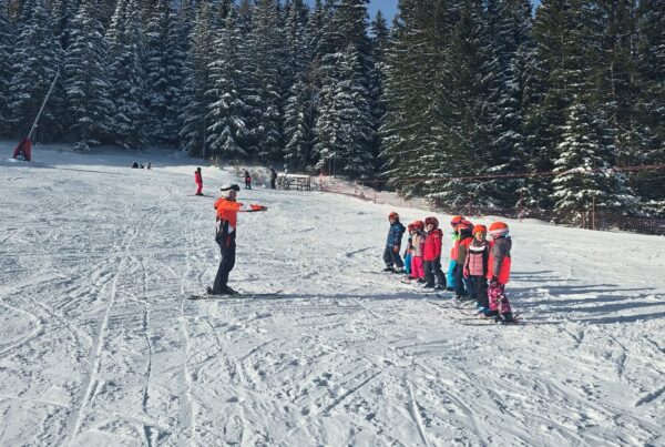 Ski school students near Sunny Kids Park